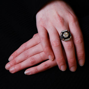 An Onyx & Diamond Plaque Ring