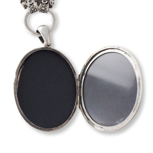 A Silver Collar and Locket