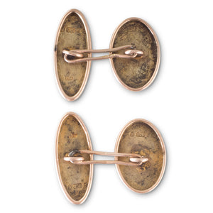 A Pair of Oval Engraved Cufflinks