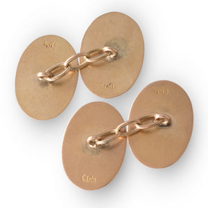 A Pair Oval Engraved Gold Cufflinks