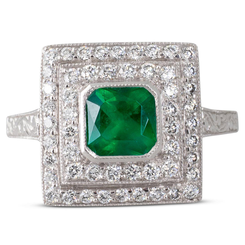 An Emerald & Diamond Cluster Ring