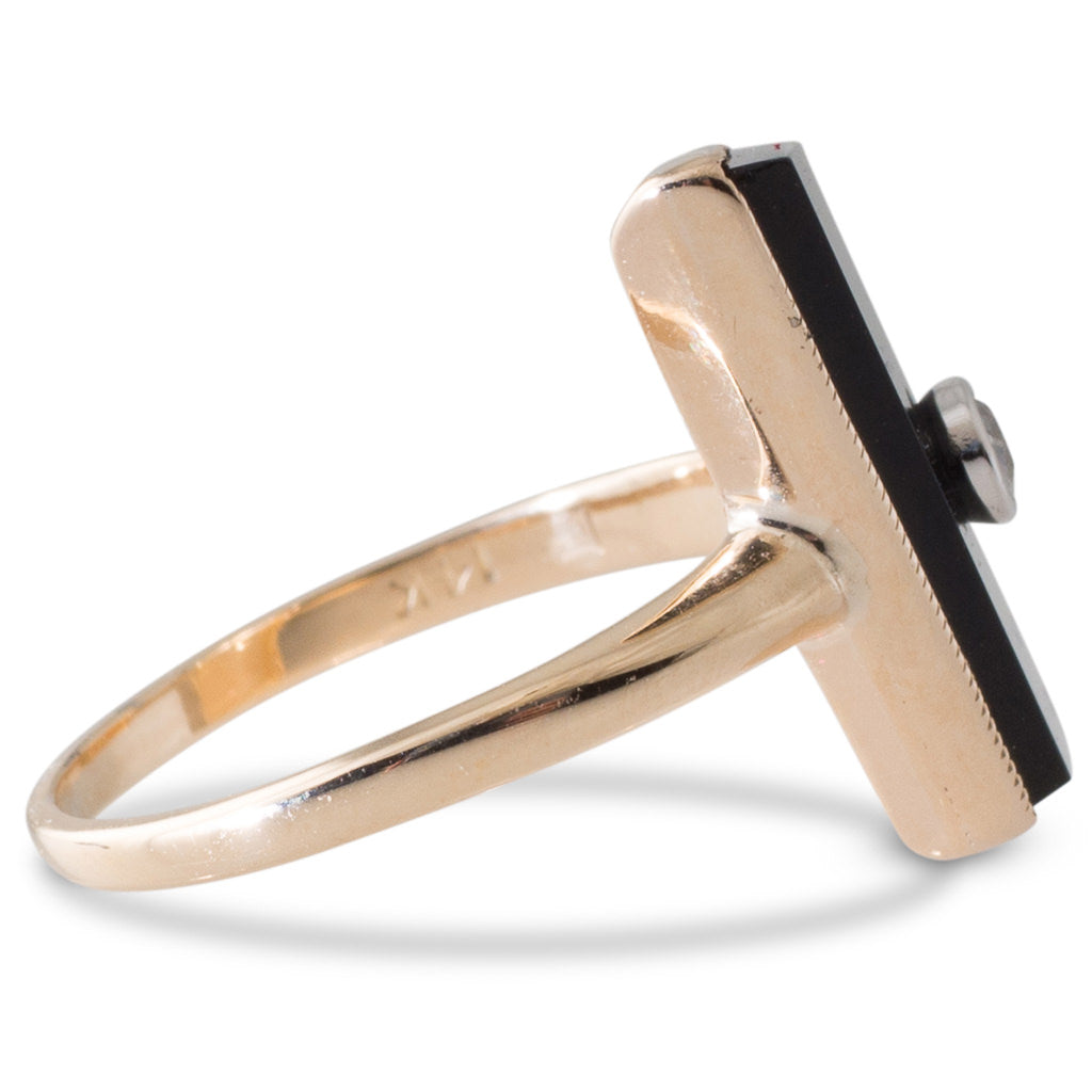 An Onyx & Diamond Ring