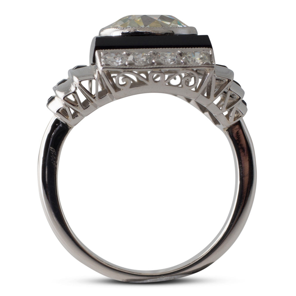 An Onyx & Diamond Plaque Ring