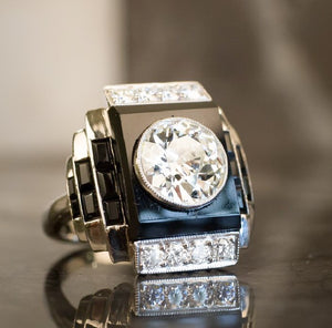 An Onyx & Diamond Plaque Ring