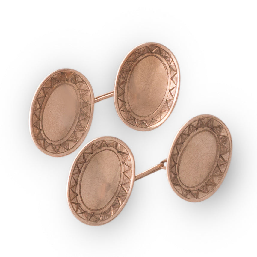 A Pair of Oval Engraved Cufflinks