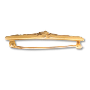 A Gold Art Nouveau Brooch