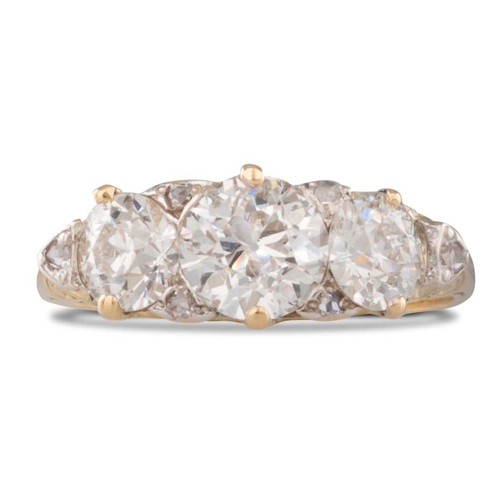 A Carved Three Stone Diamond Ring