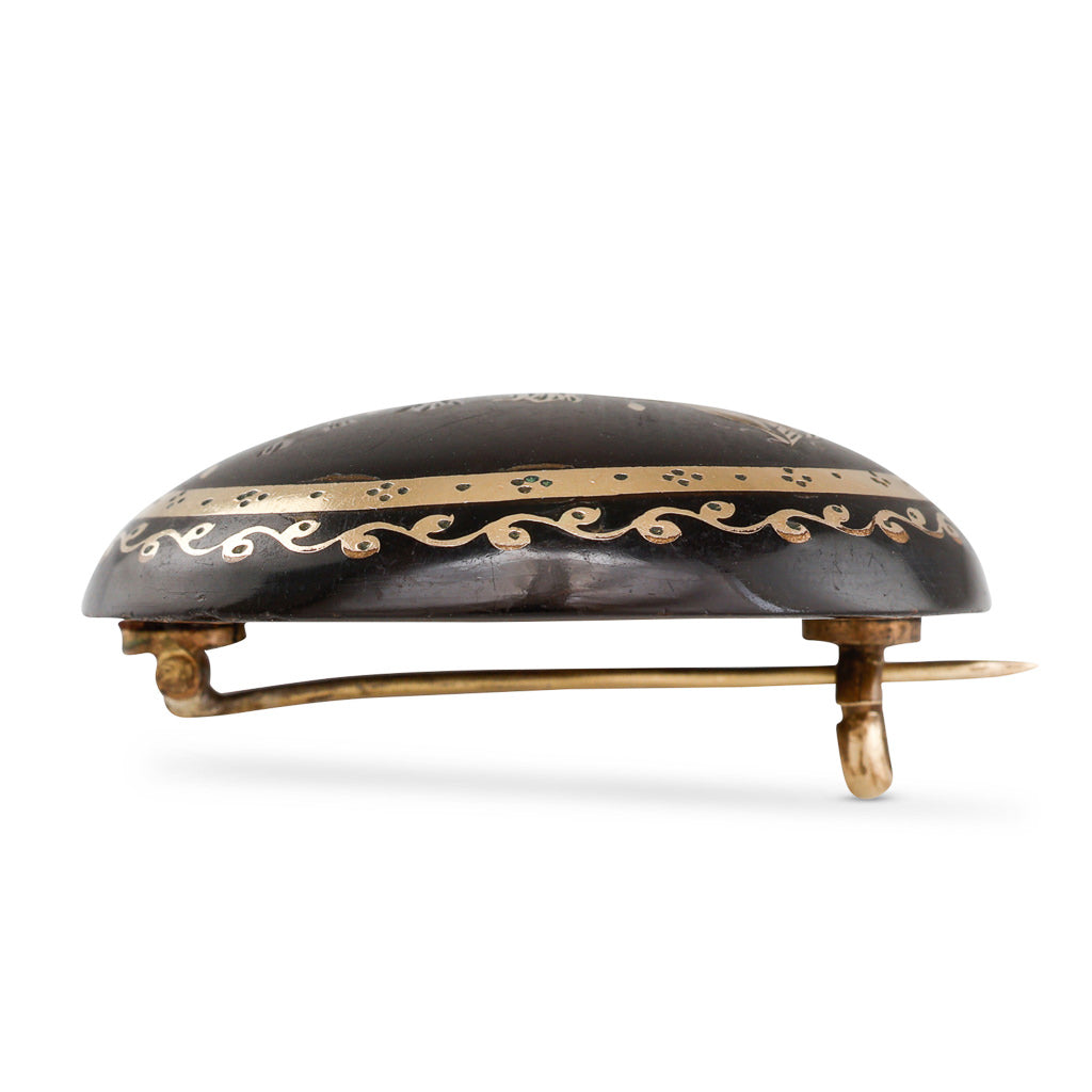 A Circular Pique Brooch