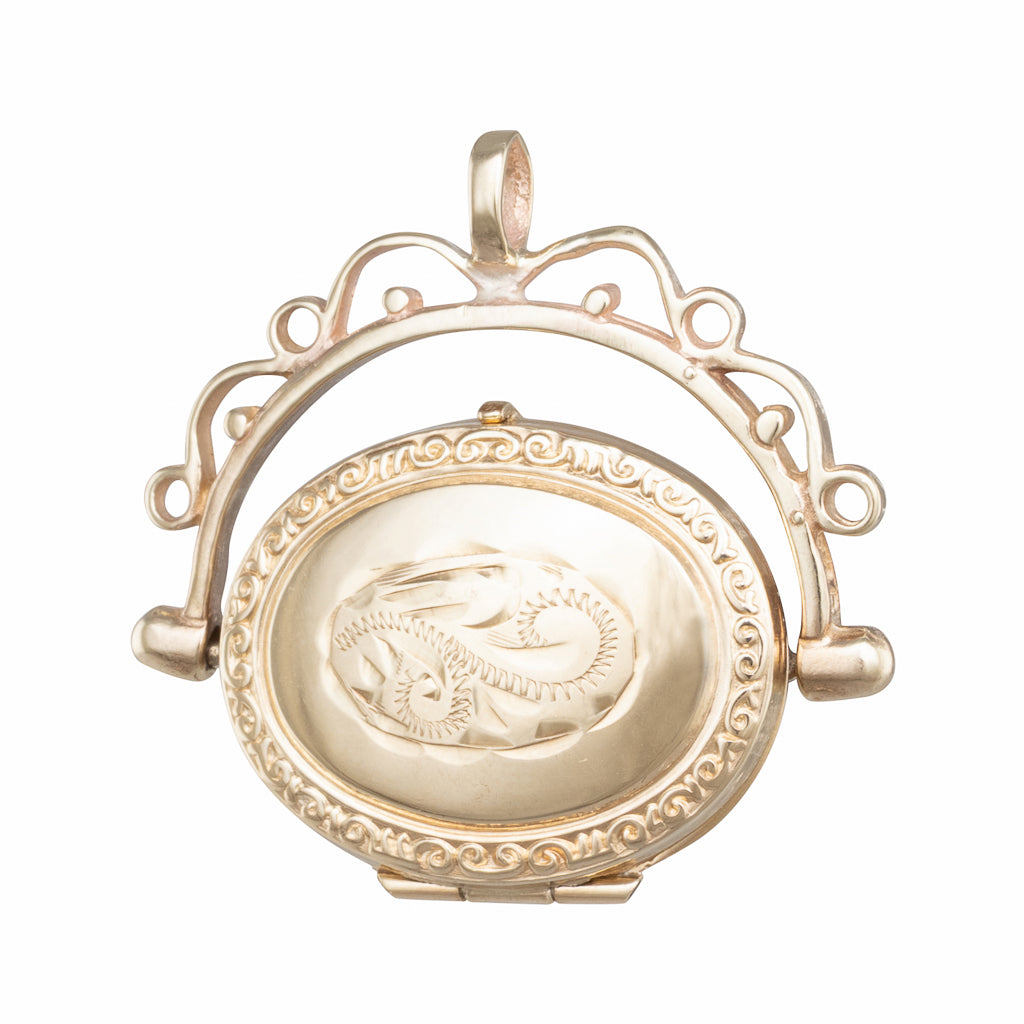 An Engraved Spinning Locket
