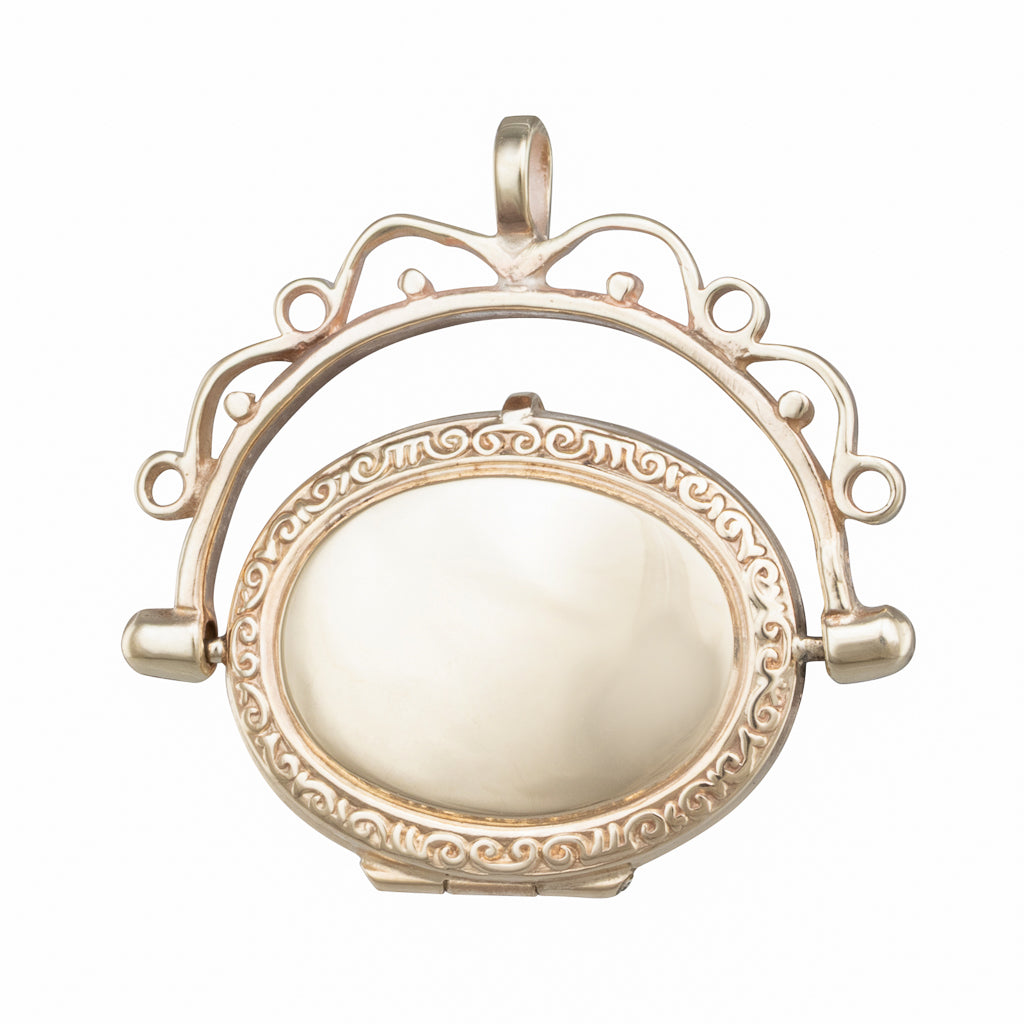 An Engraved Spinning Locket