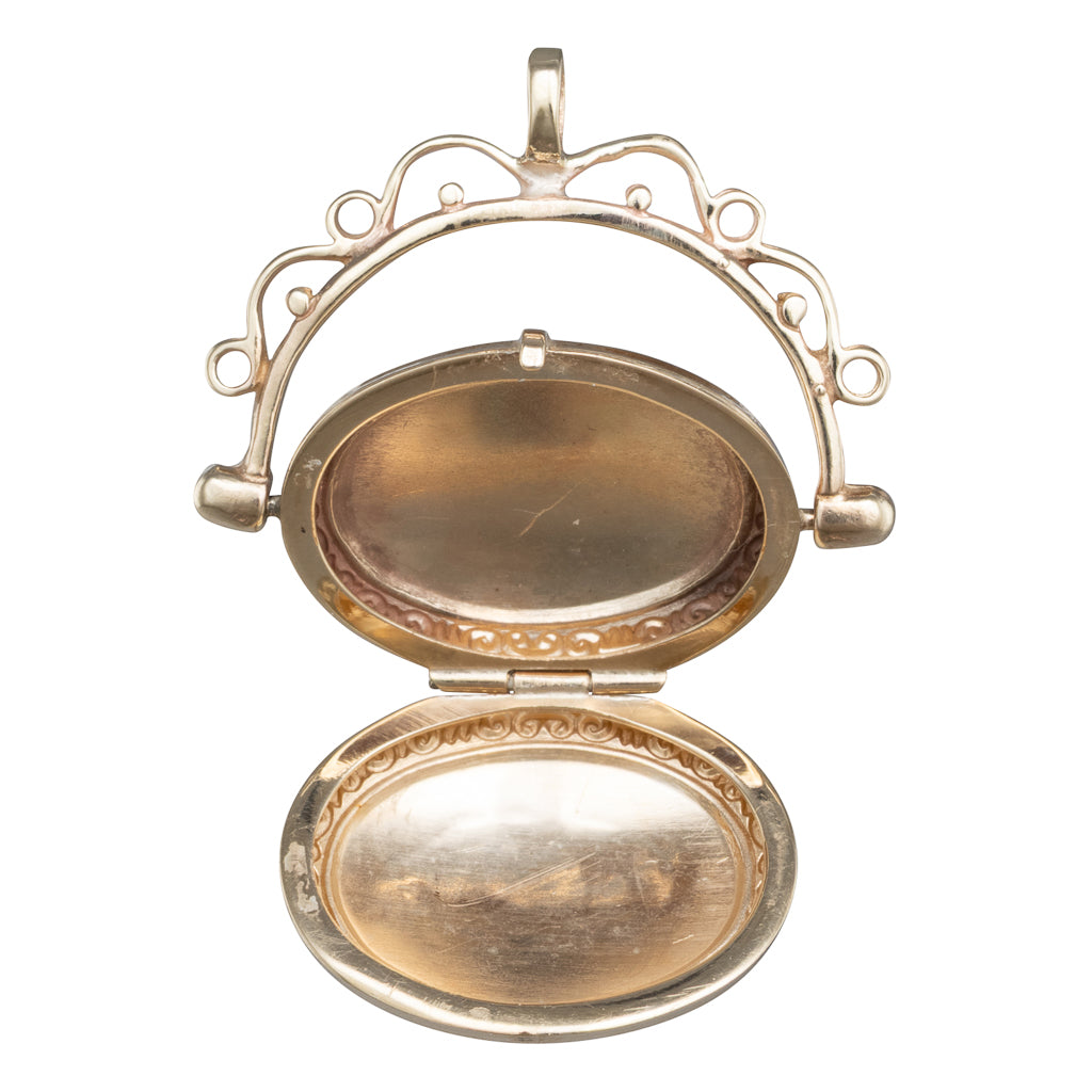 An Engraved Spinning Locket