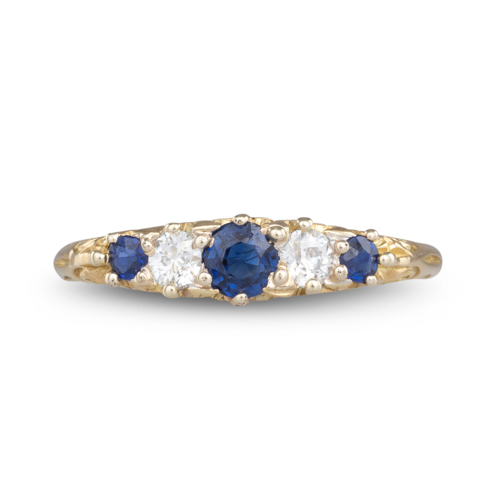 A Sapphire Half Hoop Ring