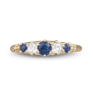 A Sapphire Half Hoop Ring