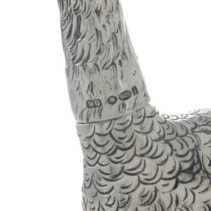 An Ostrich Chick Pepper Pot