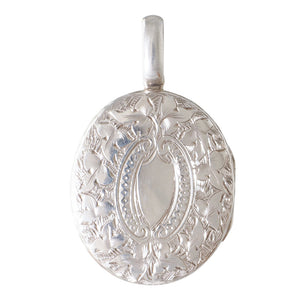 A Silver Locket with Cross