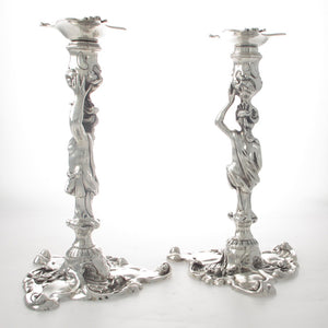 A Pair of Cast Figural Candlesticks
